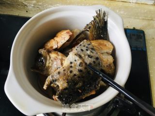 砂锅三文鱼头的做法步骤：8