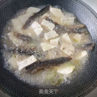 泥鳅炖豆腐的做法步骤：6