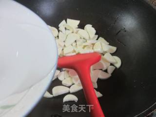 咸菜圆蛤炒茭白的做法步骤：5