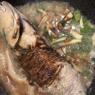 大黄鱼炖粉条的做法步骤：7