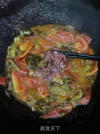 番茄酸菜炒牛肉的做法步骤：10