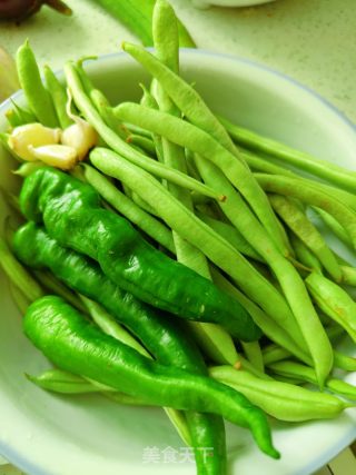 干煸四季豆的做法步骤：1