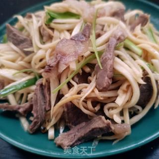 牛肉炒茭白的做法步骤：10