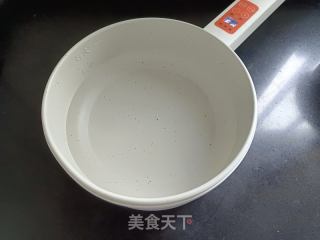 醪糟毛豆的做法步骤：2