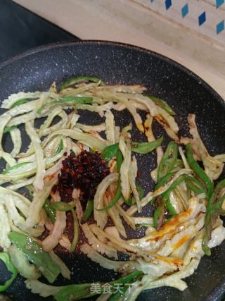 青椒豆豉炒苦瓜的做法步骤：10