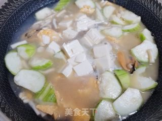丝瓜豆腐鸡蛋菌菇贻贝汤的做法步骤：10