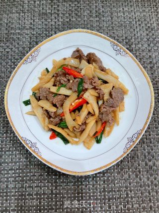 笋尖炒牛肉的做法步骤：11