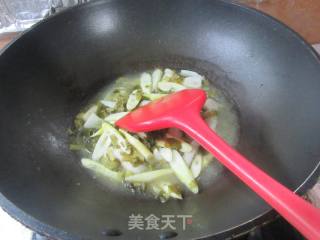 咸菜野山笋煮巴沙鱼柳的做法步骤：11