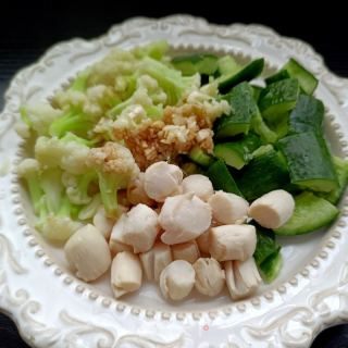 荷兰黄瓜花菜拌鲜贝的做法步骤：11