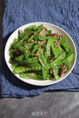 牛肉炒荷兰豆的做法步骤：8