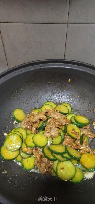 牛肉炒青瓜片的做法步骤：11