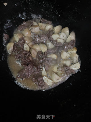 草菇炒牛肉的做法步骤：9