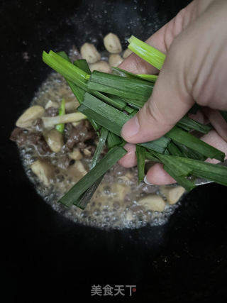 草菇炒牛肉的做法步骤：11
