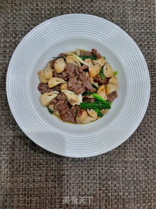 草菇炒牛肉的做法步骤：13