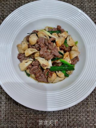 草菇炒牛肉的做法步骤：14