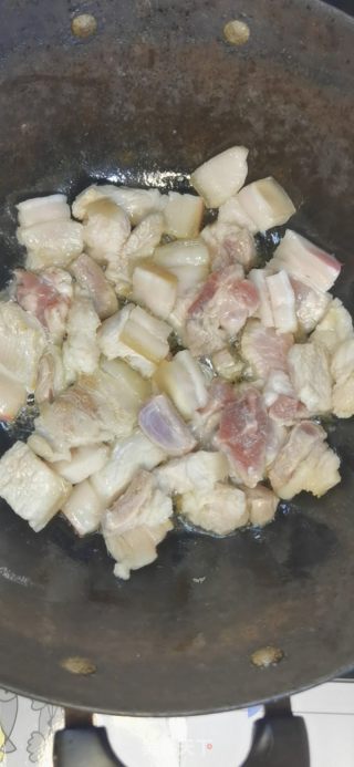 铁锅猪骨头烩酸菜的做法步骤：6