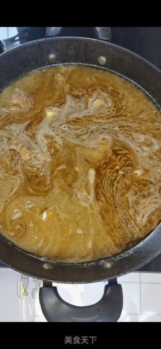 铁锅猪骨头烩酸菜的做法步骤：11