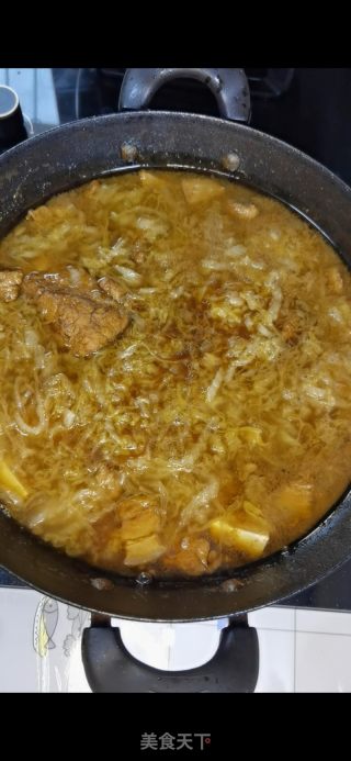 铁锅猪骨头烩酸菜的做法步骤：12