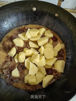 土豆烧牛肉的做法步骤：13
