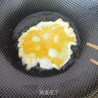 海参鸡蛋炒荷兰豆的做法步骤：9