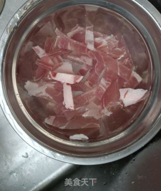 火腿鹿茸菇炒荷兰豆的做法步骤：3