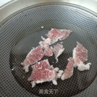 梅花肉荷兰豆炒口蘑的做法步骤：5