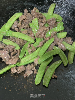牛肉炒荷兰豆的做法步骤：9