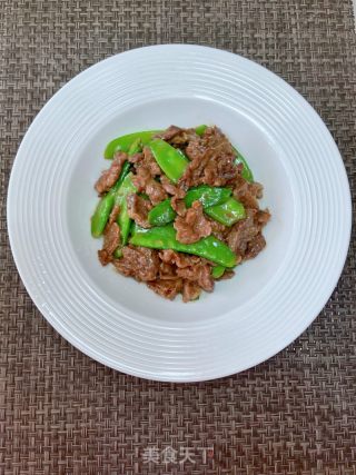 牛肉炒荷兰豆的做法步骤：10