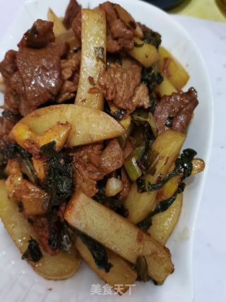 酸菜猪肉炒粉利（年糕）的做法步骤：12