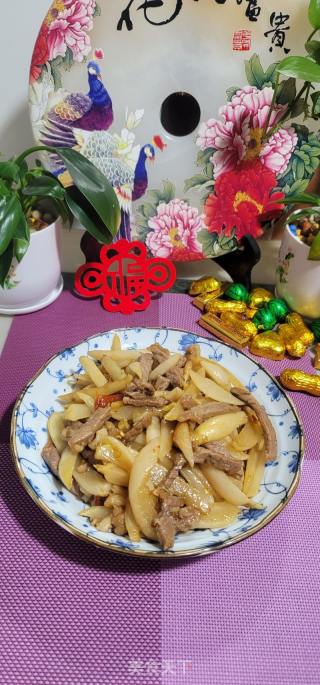 牛柳炒酸萝卜条的做法步骤：12