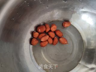 烧猪头花生瑶柱菜心粥的做法步骤：4