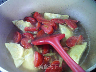 榨菜丝蛋饺番茄汤的做法步骤：7