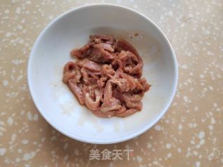 肉丝甜豆炒鱿鱼的做法步骤：7