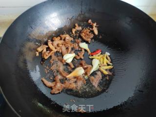 肉丝甜豆炒鱿鱼的做法步骤：9