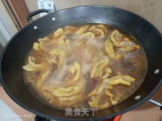 钉螺鸭脚煲的做法步骤：4