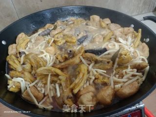 钉螺鸭脚煲的做法步骤：7