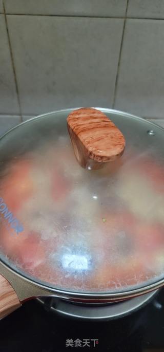 番茄烧牛白腩的做法步骤：7