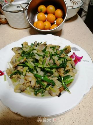 野葱炒花甲的做法步骤：5